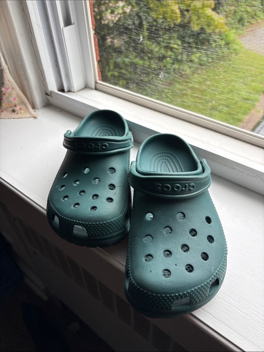 Dark green Crocs